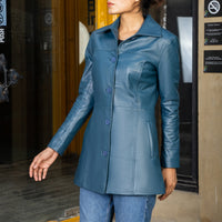 Model wearing 3/4 length leather coat for women

