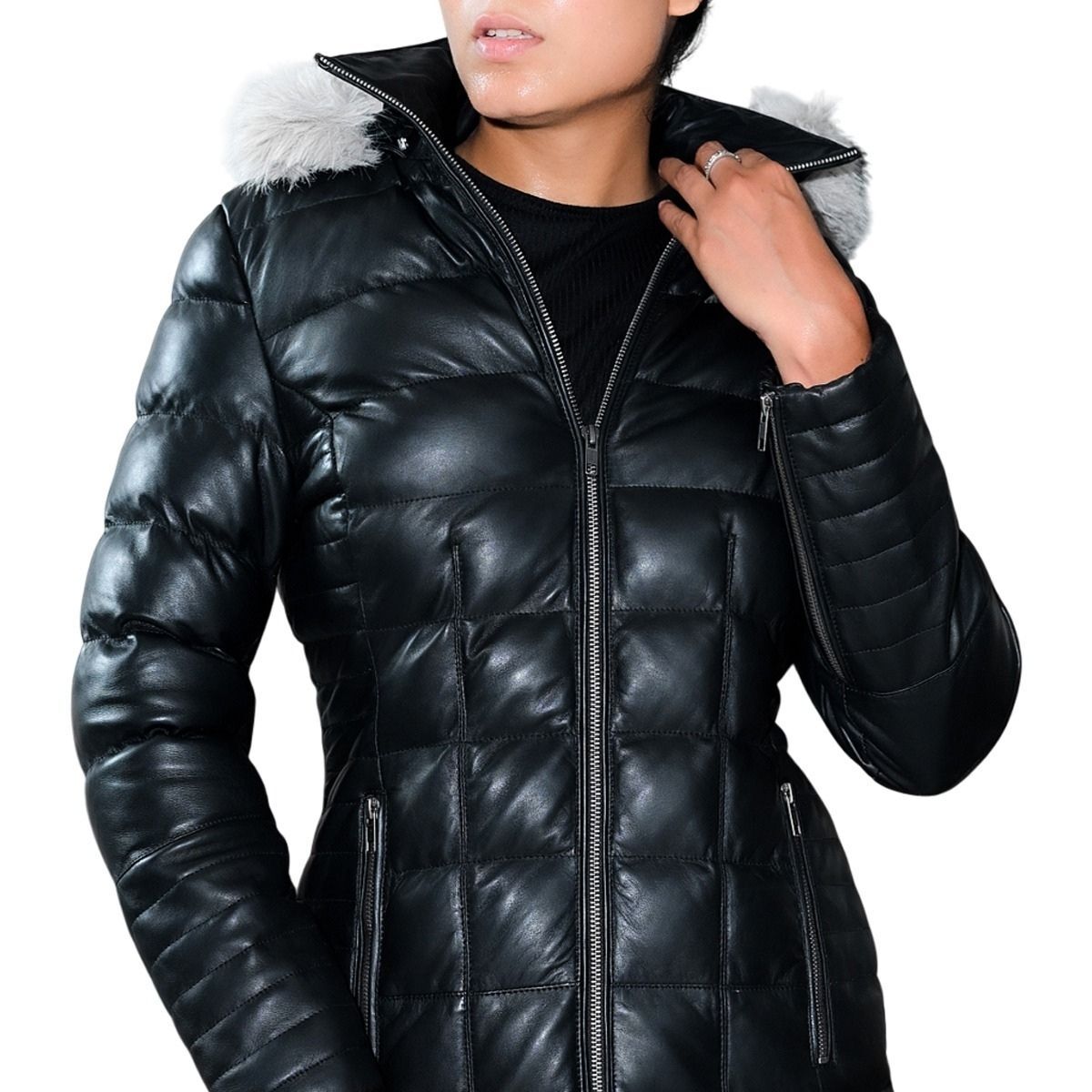 Black puffer jacket with fur hood on a white background